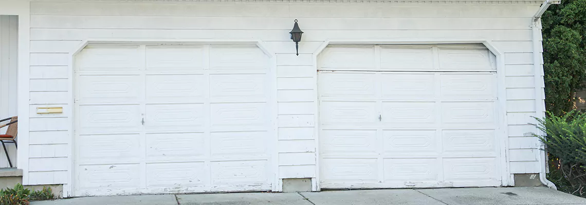 Roller Garage Door Dropped Down Replacement in Niles, IL