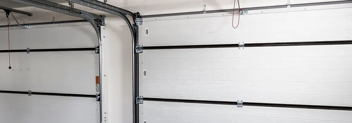 Fix Folding Garage Door Jerking in Niles, Illinois